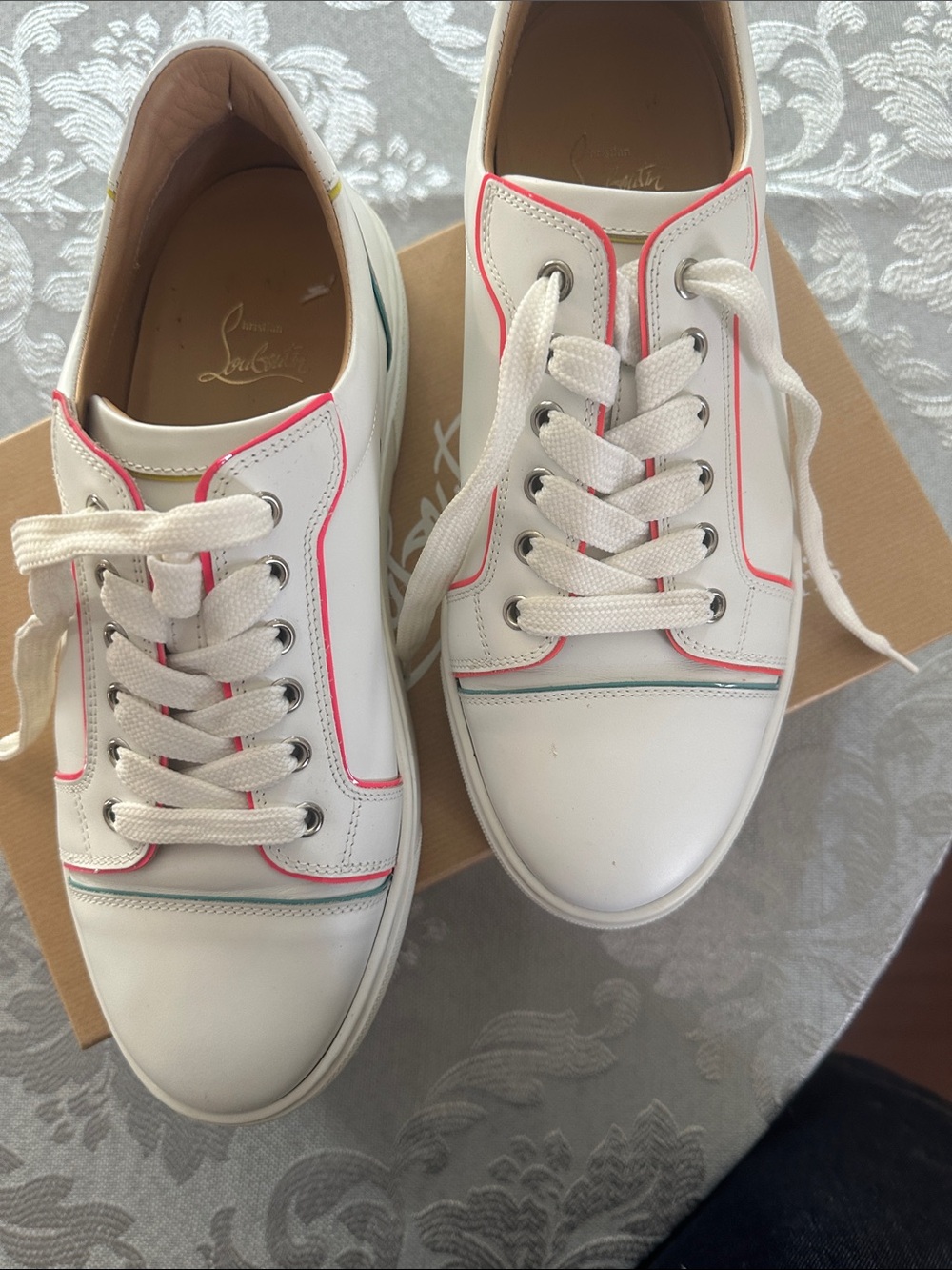 Authentic Christian Louboutin White Leather Sneakers with Pink and Teal Trim.